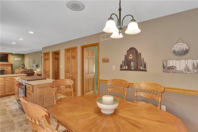115 Barrett Dr, Brighton Twp, PA 15009 - dining room featuring a chandelier and recessed lighting