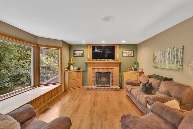 115 Barrett Dr, Brighton Twp, PA 15009 - living area with light wood-type flooring, a brick fireplace, and recessed lighting