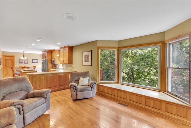 115 Barrett Dr, Brighton Twp, PA 15009 - living room featuring light wood-type flooring, recessed lighting, and a chandelier