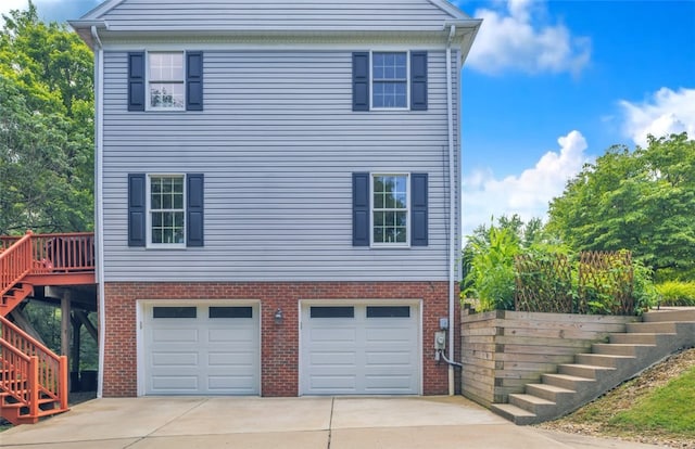 115 Barrett Dr, Brighton Twp, PA 15009 - view of front of property with stairway, brick siding, and concrete driveway