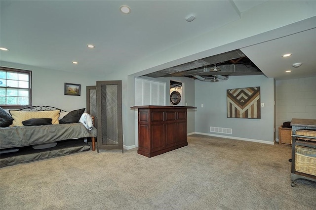 79 W Manilla Ave, Green Tree, PA 15220 - bedroom with light colored carpet, recessed lighting, a bar, and estacked washer and dryer