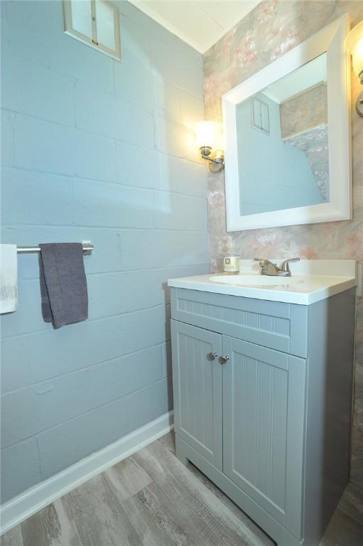 79 W Manilla Ave, Green Tree, PA 15220 - bathroom with vanity and wood finished floors