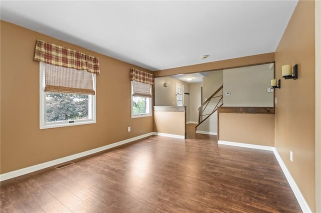1308 Heather Heights Dr, Mccandless, PA 15101 - unfurnished living room with wood finished floors and stairway