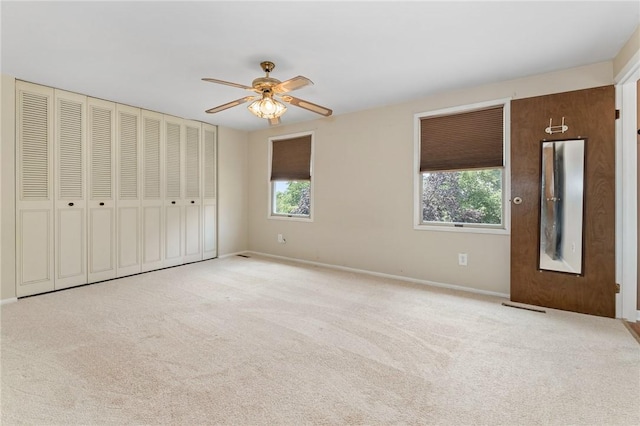 1308 Heather Heights Dr, Mccandless, PA 15101 - unfurnished bedroom featuring multiple windows, carpet floors, and ceiling fan