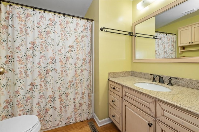1308 Heather Heights Dr, Mccandless, PA 15101 - full bathroom featuring wood finished floors, vanity, and a shower with curtain