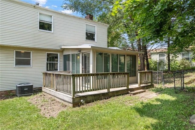 1308 Heather Heights Dr, Mccandless, PA 15101 - back of house featuring a sunroom, a wooden deck, and a chimney