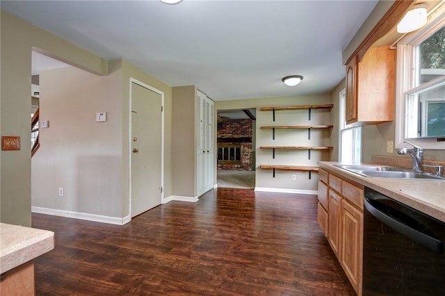 1308 Heather Heights Dr, Mccandless, PA 15101 - kitchen featuring black dishwasher, a fireplace, dark wood-type flooring, light countertops, and light brown cabinets
