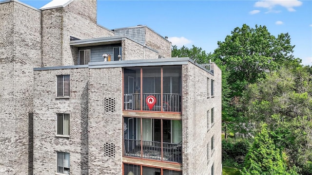 2120 Greentree Rd Unit 610E, Pittsburgh, PA 15220 - view of side of property with brick siding and a sunroom
