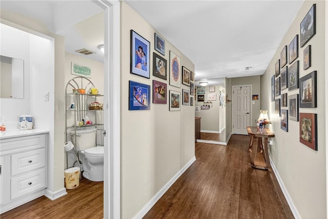 2120 Greentree Rd Unit 610E, Pittsburgh, PA 15220 - hall with dark wood finished floors and baseboards