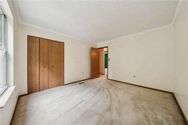 437 Shady Ridge Dr, Monroeville, PA 15146 - unfurnished bedroom with a closet, light colored carpet, and ornamental molding