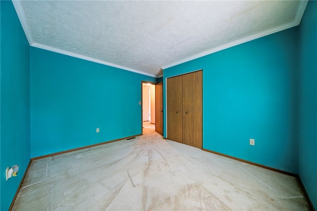 437 Shady Ridge Dr, Monroeville, PA 15146 - unfurnished bedroom featuring carpet floors, ornamental molding, a closet, and a textured ceiling