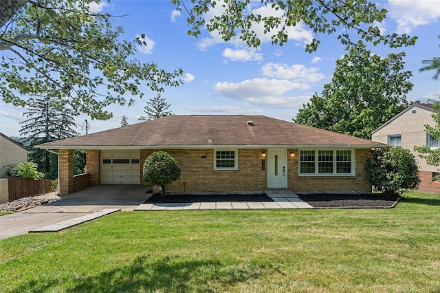 900 N Whitmore Rd, North Huntingdon, PA 15642 - single story home featuring driveway, brick siding, and an attached garage