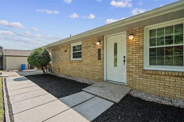 900 N Whitmore Rd, North Huntingdon, PA 15642 - property entrance featuring brick siding
