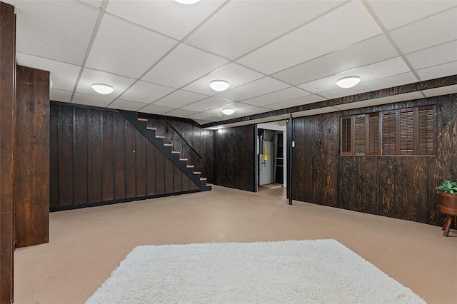 900 N Whitmore Rd, North Huntingdon, PA 15642 - finished below grade area featuring wooden walls, stairs, and a paneled ceiling