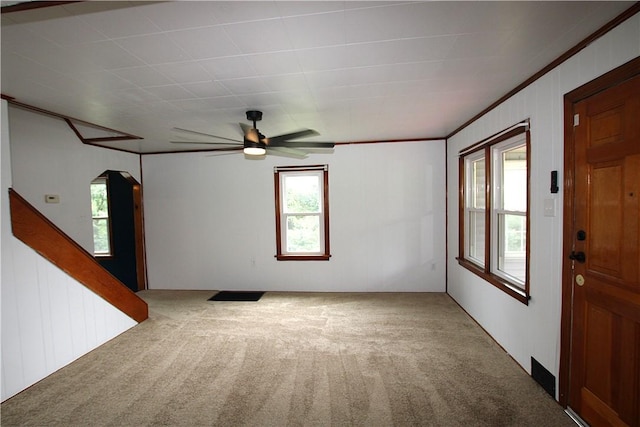 216 Duffy Dr, Moon/Crescent Twp, PA 15108 - spare room with carpet, arched walkways, ceiling fan, and ornamental molding