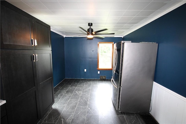 216 Duffy Dr, Moon/Crescent Twp, PA 15108 - unfurnished bedroom featuring freestanding refrigerator, dark marble finish flooring, and a wainscoted wall