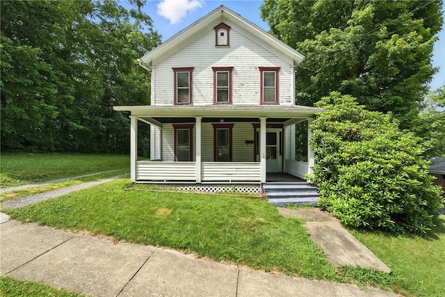339 E Market St, Mercer Boro, PA 16137 - view of front of home featuring a porch and a front lawn