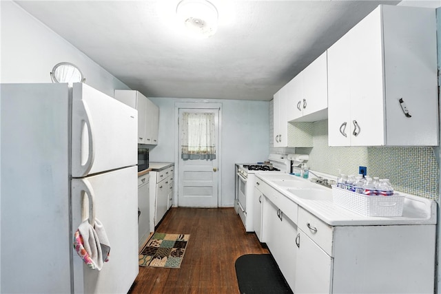 339 E Market St, Mercer Boro, PA 16137 - kitchen featuring white appliances, dark wood finished floors, white cabinets, tasteful backsplash, and light countertops