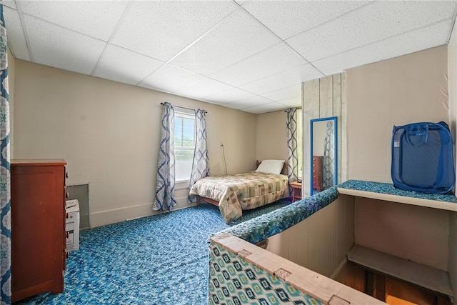 339 E Market St, Mercer Boro, PA 16137 - carpeted bedroom featuring a drop ceiling and wood walls