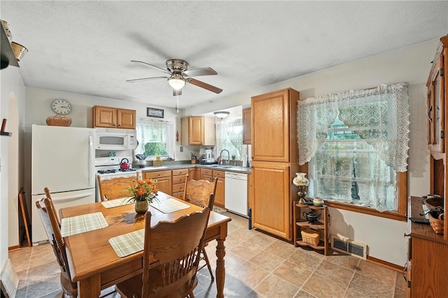 231 E N St, Mercer Boro, PA 16137 - kitchen featuring white appliances, ceiling fan, and a textured ceiling