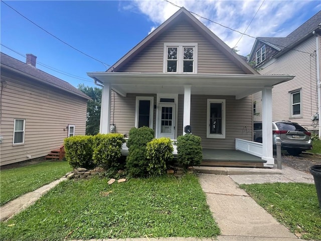721 Center Ave, City Of But Se, PA 16001 - bungalow with covered porch and a front yard