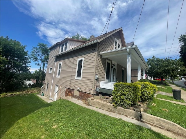 721 Center Ave, City Of But Se, PA 16001 - view of side of home with a porch and a yard