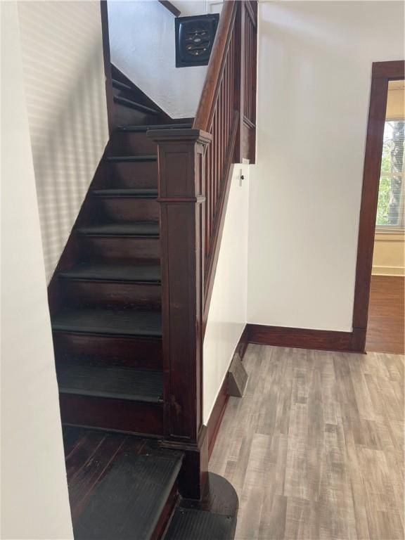 721 Center Ave, City Of But Se, PA 16001 - stairs with wood finished floors and baseboards