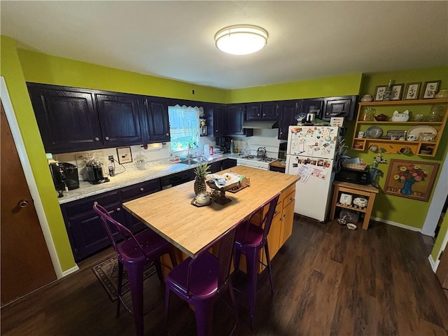964 Ringgold St, Crafton Heights, PA 15220 - kitchen with white appliances, dark wood-style flooring, dark cabinets, and a center island
