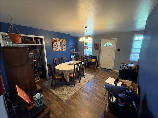 964 Ringgold St, Crafton Heights, PA 15220 - dining area featuring plenty of natural light, wood finished floors, and a chandelier