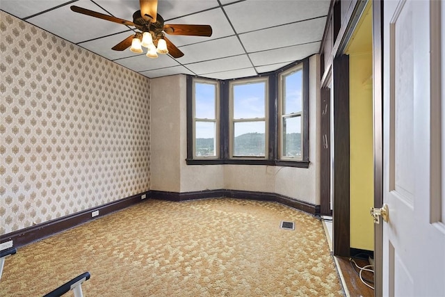 849 Hiland Ave, Coraopolis, PA 15108 - carpeted spare room with wallpapered walls and a ceiling fan