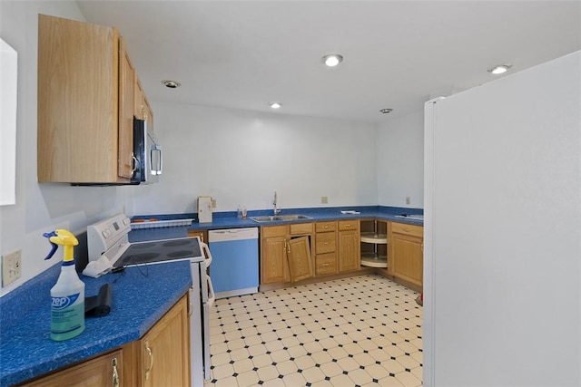 849 Hiland Ave, Coraopolis, PA 15108 - kitchen featuring white appliances, dark countertops, light flooring, and recessed lighting