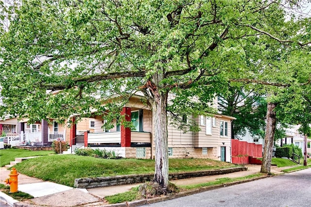 200 38th St, Beaver Falls, PA 15010 - obstructed view of property with covered porch and a front lawn