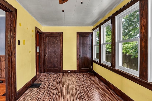 200 38th St, Beaver Falls, PA 15010 - unfurnished bedroom featuring dark wood-style flooring and crown molding