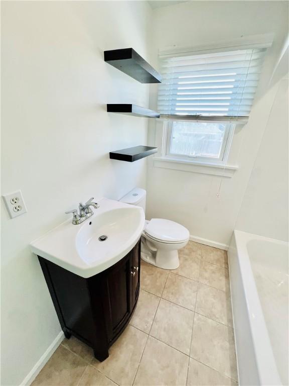 26 Wilmac St, South Union Twp, PA 15401 - full bath with a bathtub, tile patterned floors, and vanity