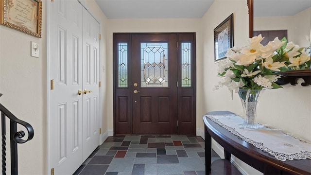 11 Sunnycrest Dr, Cecil, PA 15321 - foyer entrance featuring baseboards and dark stone finish floors