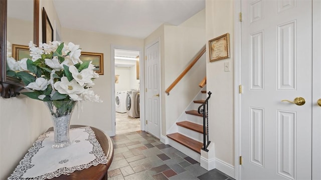 11 Sunnycrest Dr, Cecil, PA 15321 - entrance foyer featuring separate washer and dryer, stairs, and stone tile flooring