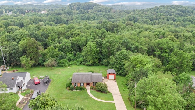 1556 Washington Rd, Washington Twp, PA 15613 - aerial view of property and surrounding area featuring a heavily wooded area