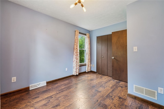 1556 Washington Rd, Washington Twp, PA 15613 - unfurnished bedroom with wood finished floors and a closet