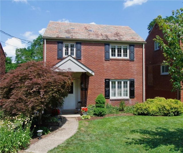 731 Kewanna Ave, Mt Lebanon, PA 15234 - view of front of home with a front yard and brick siding