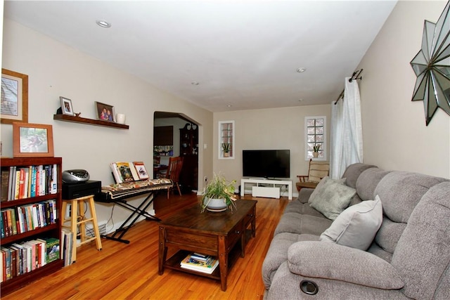 731 Kewanna Ave, Mt Lebanon, PA 15234 - living area featuring arched walkways and wood finished floors