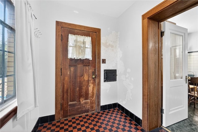510 7th St, Patterson Heights, PA 15010 - foyer with tile patterned floors and baseboards