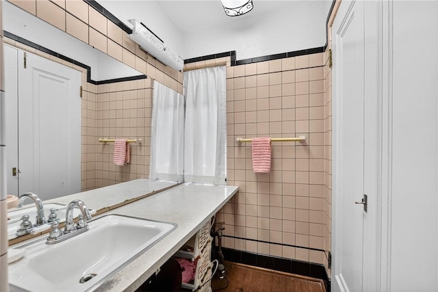 510 7th St, Patterson Heights, PA 15010 - bathroom with tile walls, vanity, and wood finished floors