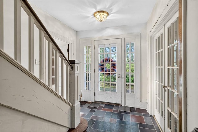 510 7th St, Patterson Heights, PA 15010 - entrance foyer featuring stairs, french doors, and stone finish floors