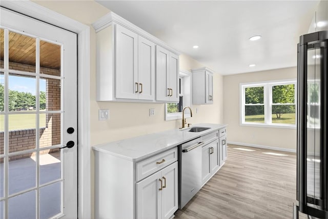 545 Vanderbilt Rd, Dunbar Twp, PA 15425 - kitchen with appliances with stainless steel finishes, white cabinets, light wood finished floors, light stone countertops, and recessed lighting