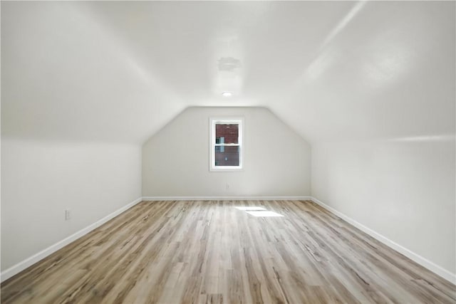545 Vanderbilt Rd, Dunbar Twp, PA 15425 - bonus room featuring wood finished floors and lofted ceiling