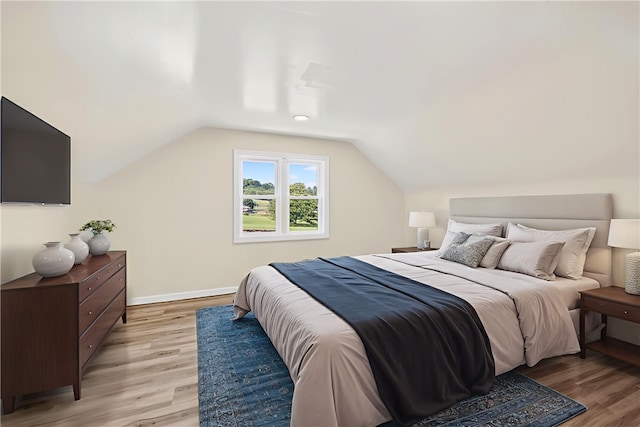 545 Vanderbilt Rd, Dunbar Twp, PA 15425 - bedroom with light wood-type flooring and vaulted ceiling