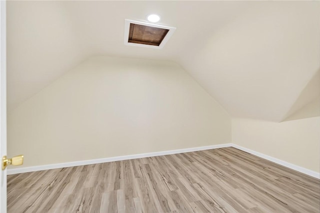 545 Vanderbilt Rd, Dunbar Twp, PA 15425 - additional living space featuring vaulted ceiling, light wood-type flooring, and attic access