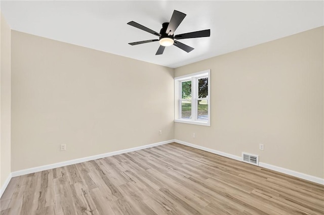545 Vanderbilt Rd, Dunbar Twp, PA 15425 - empty room featuring light wood finished floors and ceiling fan