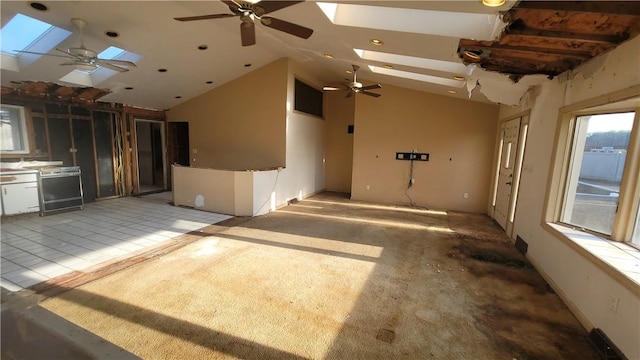 1442 Greensburg Pike, Sewickley Twp, PA 15089 - unfurnished living room featuring a skylight, ceiling fan, vaulted ceiling, and recessed lighting