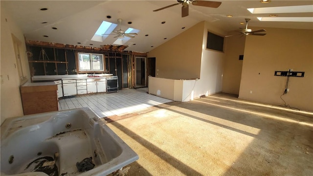 1442 Greensburg Pike, Sewickley Twp, PA 15089 - kitchen featuring a skylight, ceiling fan, and lofted ceiling